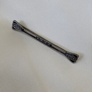 Antique Sterling Silver Decorative Metal brooch with diamond chips